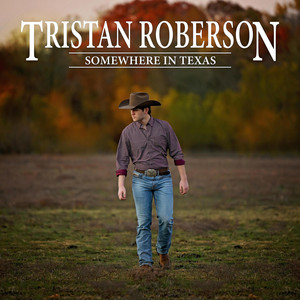 Cowboy walking in field, album cover.