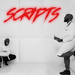 Two people in white suits in a white room.